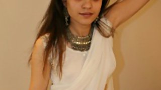 jasmine in white Indian saree looking hot teasing her man